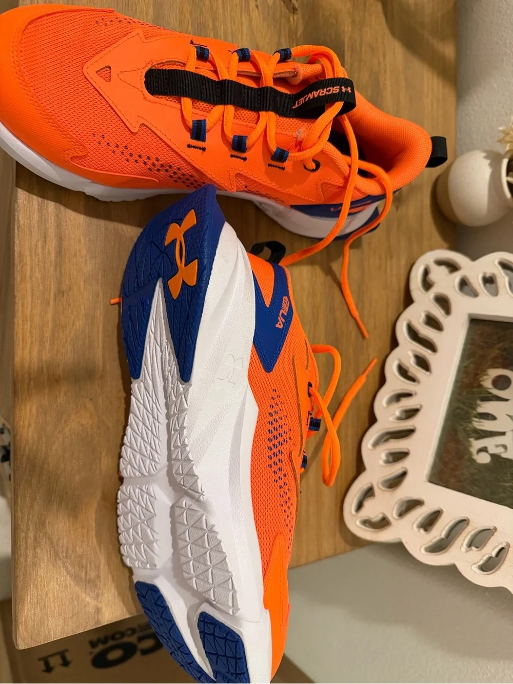 Under Armour Bright Orange Kids Sneakers with Black Accents